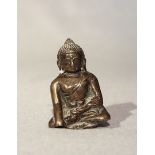 A Tibetan bronze fragmentary small Buddha, seated in meditation, 16th century or later,