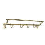 An early twentieth century brass 'Pullman' style luggage/coat rack,