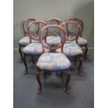 A set of six Victorian mahogany balloon back dining chairs (6)
