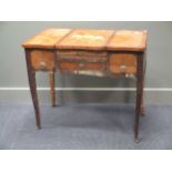 A French early 19th century kingwood and inlaid dressing table with three compartments, the