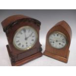 A mid 19th century walnut cased mantle clock, 29cm high, together with another mantel clock, the