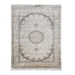 A large 'Hereke' style silk carpet,