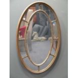 A Sheraton revival gilt framed oval wall mirror 98 x 62cm