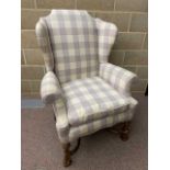 A William & Mary style wing back armchair