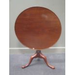 A 19th century mahogany tilt top tripod table 71cm high and 79cm diameter