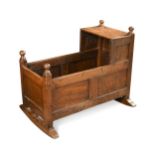 An early 18th century style oak cradle,(79 x 45 x 92cm)