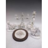 A pair of Thomas Goode and Co blanc de chine porcelain figures and three various similar figures and