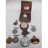 A gold fob watch, a silver pocket watch and plated pocket watch, various war medals awarded to G. F.
