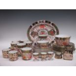 A quantity of matched Royal Crown Derby and Crown Derby imari plates, cups, slop bowl etc