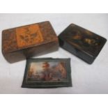 A Mauchline ware table snuff box, the cover decorated with a crest, 11cm wide; a papier-mache double