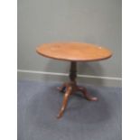 A George III mahogany tripod table, 69 x 81 diam cm