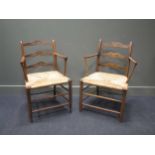 Two similar 19th century rush seated country elbow chairs