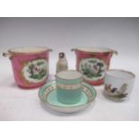A pair of Sevres two-handled cache pots, painted with fanciful birds, reserved on pink ground