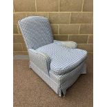 A 19th century easy chair in the Howard manner with blue gingham upholstery