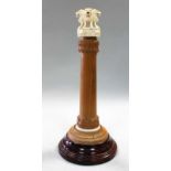 A Ceylonese carved wood and ivory Capital of Ashoka desk piece, circa 1930,