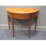 A Regency mahogany fold over card table 74 x 91 x 45cm