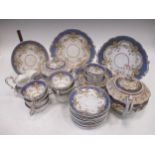 A mid 19th century English porcelain tea service, probably Rockingham together with various other