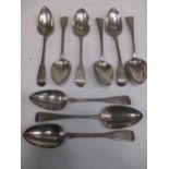 Nine various large table spoons, c.22oz