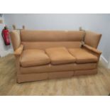 A yellow/buff upholstered Knowle sofa, 190cm wide