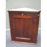 An early 19th century oak plate rack, 107 x 125cm, together with a 19th century corner cupboard,