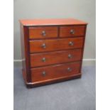 A mid-Victorian mahogany round cornered chest of two short over three long graduating drawers 102