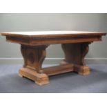 A late 19th century hall table with carved baroque style supports joined by an H framed stretcher,