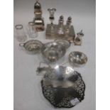 A silver cigarette box, various small silver dishes, sugar caster etc.