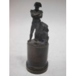 A small bronze statue of Napoleon on a cylindrical plinth, 12.5cm high