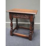 A 17th century style oak joined stool with carved decoration from "Titchmarsh & Goodwin", 46 x 45.