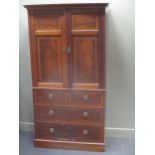 An early 20th century mahogany and cross banded linen press, top section with a pair of panelled