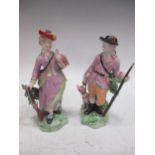 A pair of Derby patch marked figures of hunters