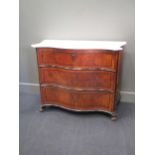 A marble top serpentine chest of three drawers, with scroll feet 85 x 95 x 50cm