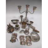 A pair of Georgian silver salts, six silver wine and spirit labels, various condiments and other