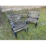 A set of four wrought iron garden chairs with timber slats (4)