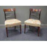 A pair of Regency inlaid mahogany side chairs