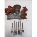 An Indian white metal tapering scarf (?) holder, 2.7ozt, six small Jensen forks, 2.8ozt, and an
