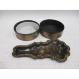 A pair of 19th century papier mache bottle coasters and a spoon rest (3)