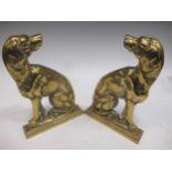 A pair of brass spaniel dog side profile door stops, 19th century, adapted from andirons, 32cm and