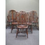 A set of six oak hoop back 19th century style Windsor dining chairs, the elm saddle seats over
