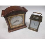 A Matthew Norman carriage clock together with a wooden cased mantel clock by Elliott (2)