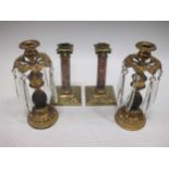 A pair of 19th century gilt metal candle lustres and a pair of candlesticks