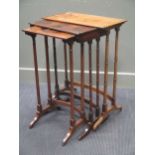 Three Regency mahogany nesting tables (not matching)