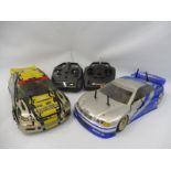 A Kyosho Volvo S40 BTCC 4WD nitro saloon remote controlled car plus an Academy 4WD nitro saloon with