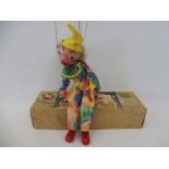 A boxed Pelham puppet 'Clown', late 1950s, very good condition, moving mouth version with original