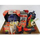 A box of plastic toys including boxed Transformers, Justice League, Mysterions etc.