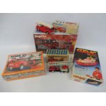 Three boxed model kits, Fire Brigade related, plus a friction drive fire engine, made in Hong Kong
