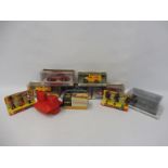 Two Britains Ltd carded sets of 'New Metal Models', plus various boxed die-cast models including