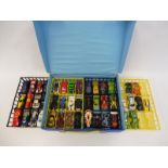 A Matchbox Carry Case with assorted contents.