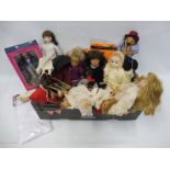 A selection of dolls and toys including a puppet, contemporary porcelain headed dolls, Barbie etc.