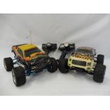 An HPI Racing 4WD nitro Monster Truck with controller plus an HSP Tyrannosaurus 4WD nitro